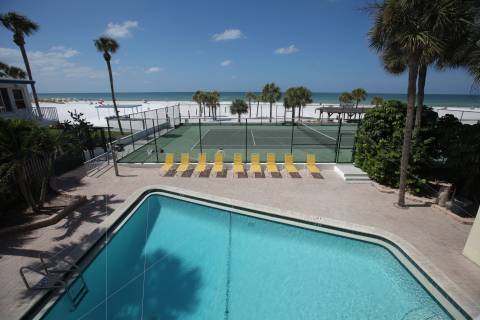 A community pool and tennis court